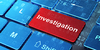 Keyboard with red 'Investigation' button