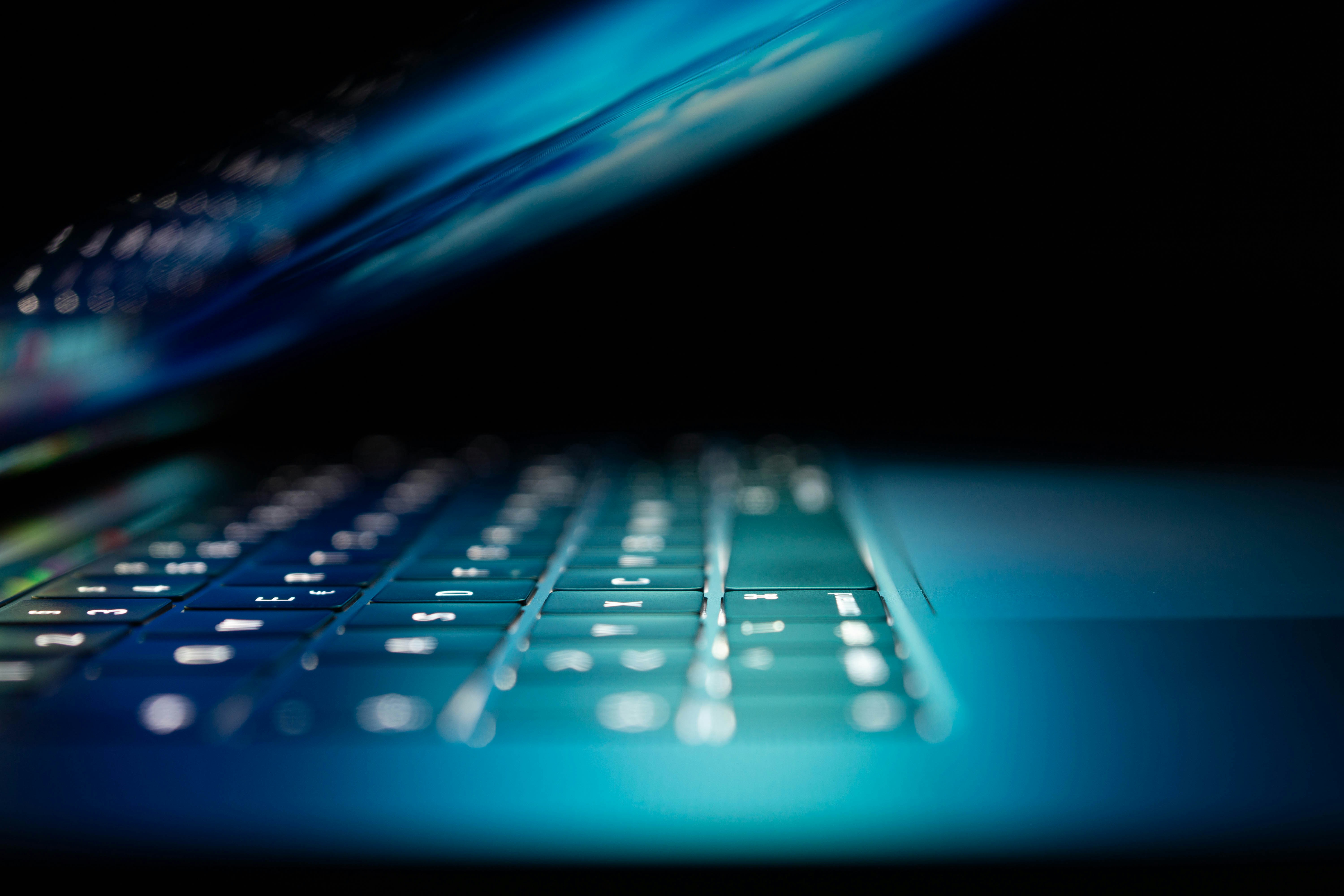 Semi open laptop in blue tones